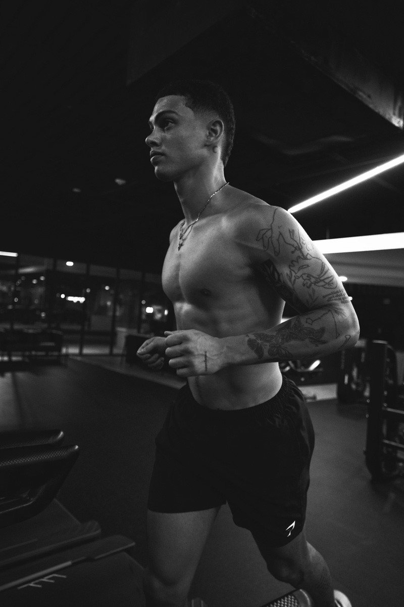The coach is running at the gym.